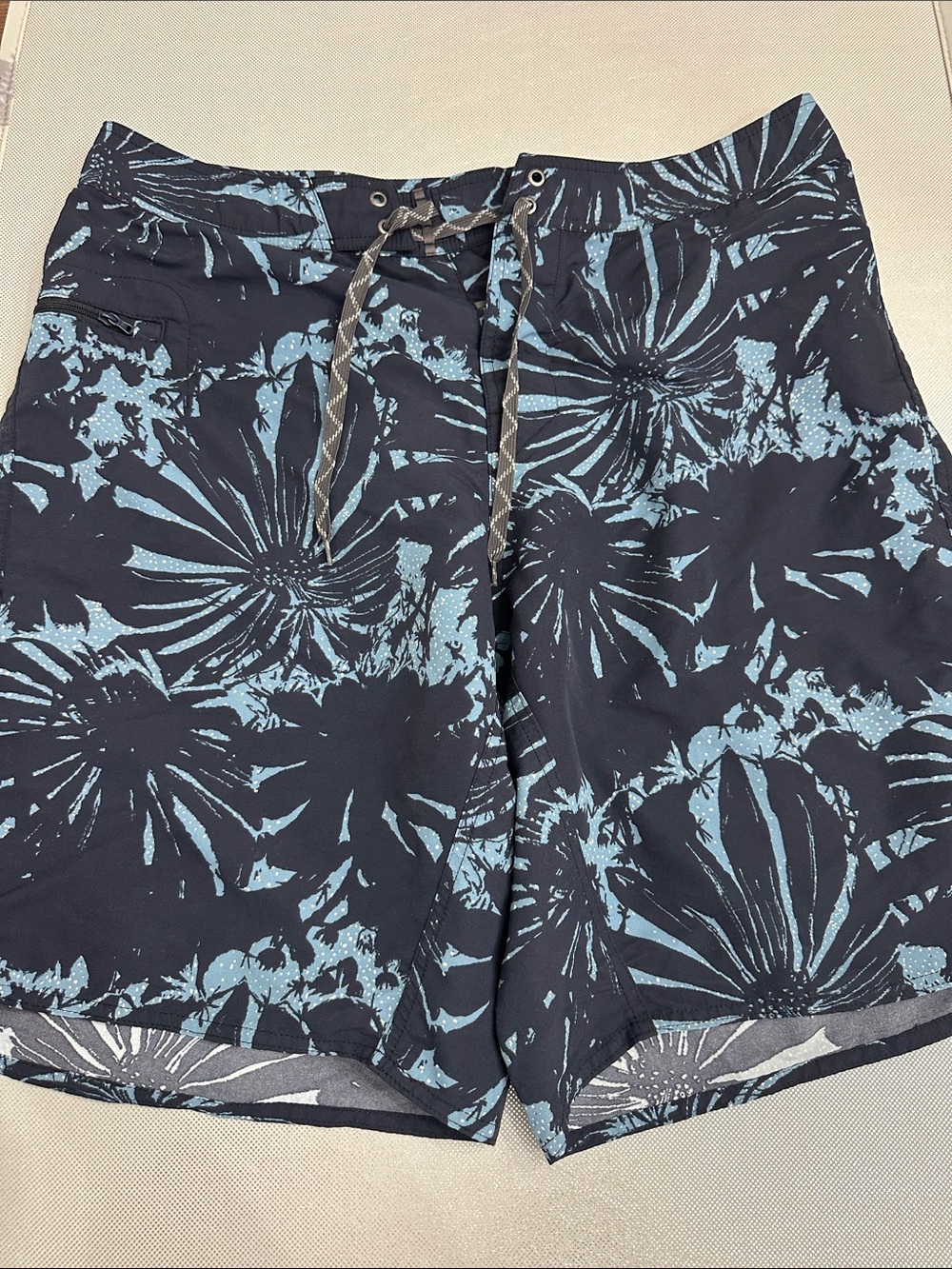 Patagonia Navy Swim Shorts with Light Blue Floral Pattern